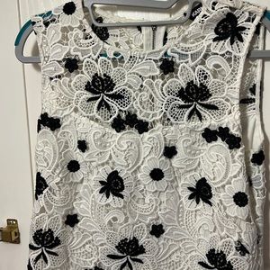 A beautiful white dress with embroidered flowers